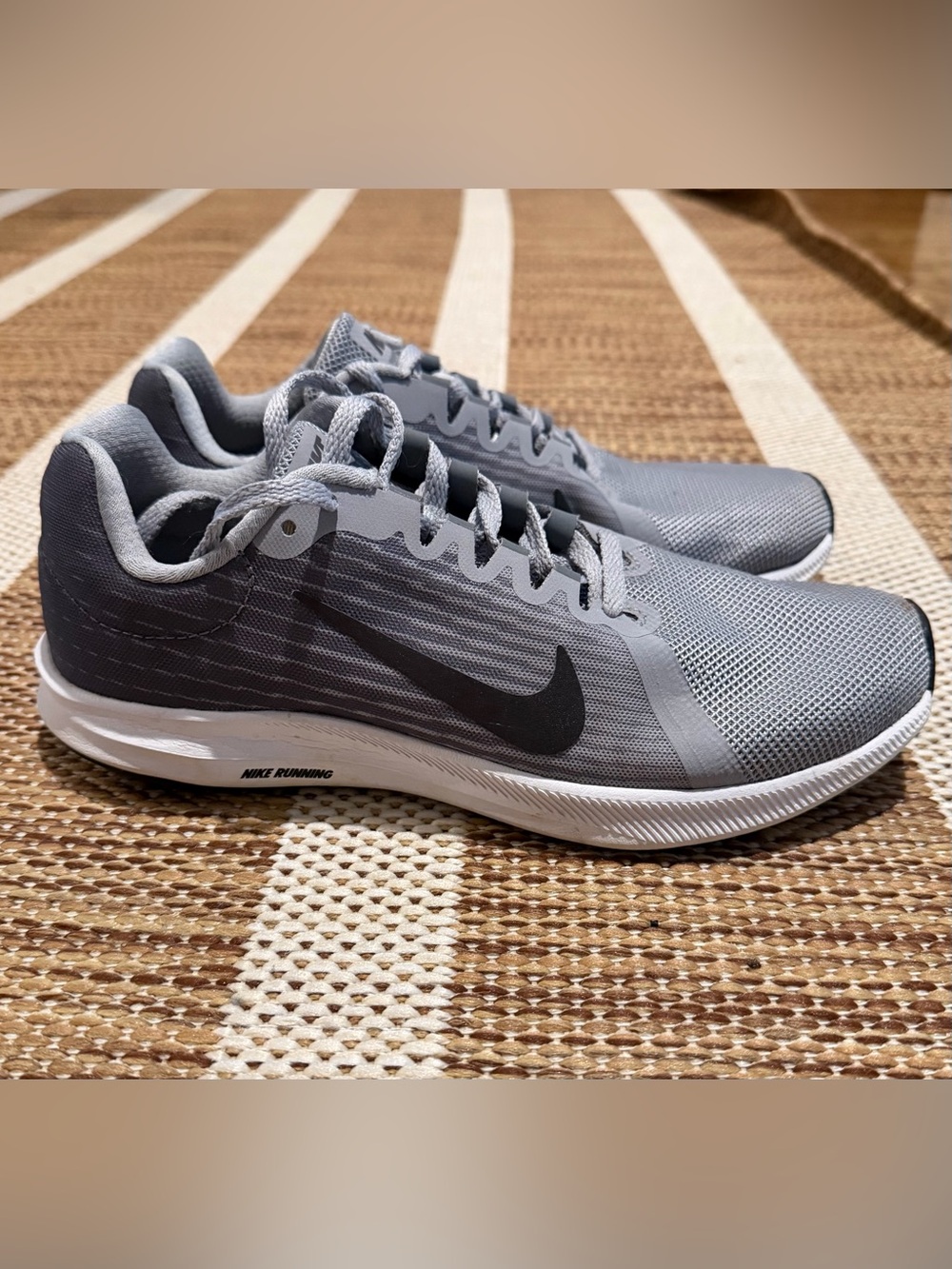 Nike Light Gray Mesh Running Sneakers with Black Swoosh